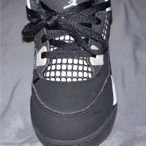 Jordan Black and White Sneakers with Sporty Design